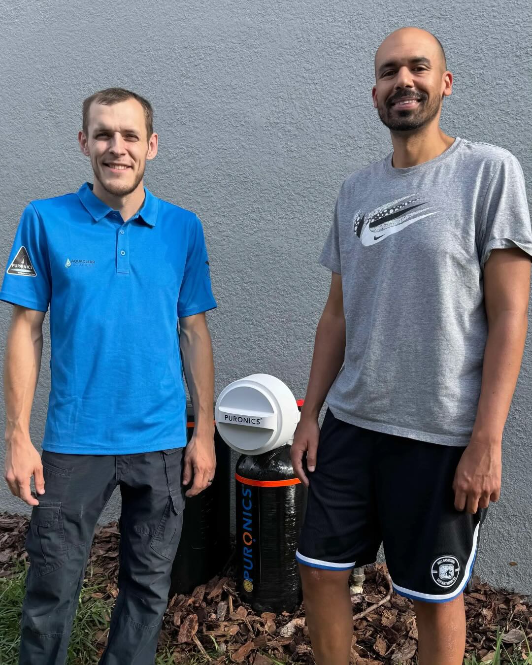 Happy client with Water Filtration System installed by AquaClear Solutions FL in Belle Isle, FL