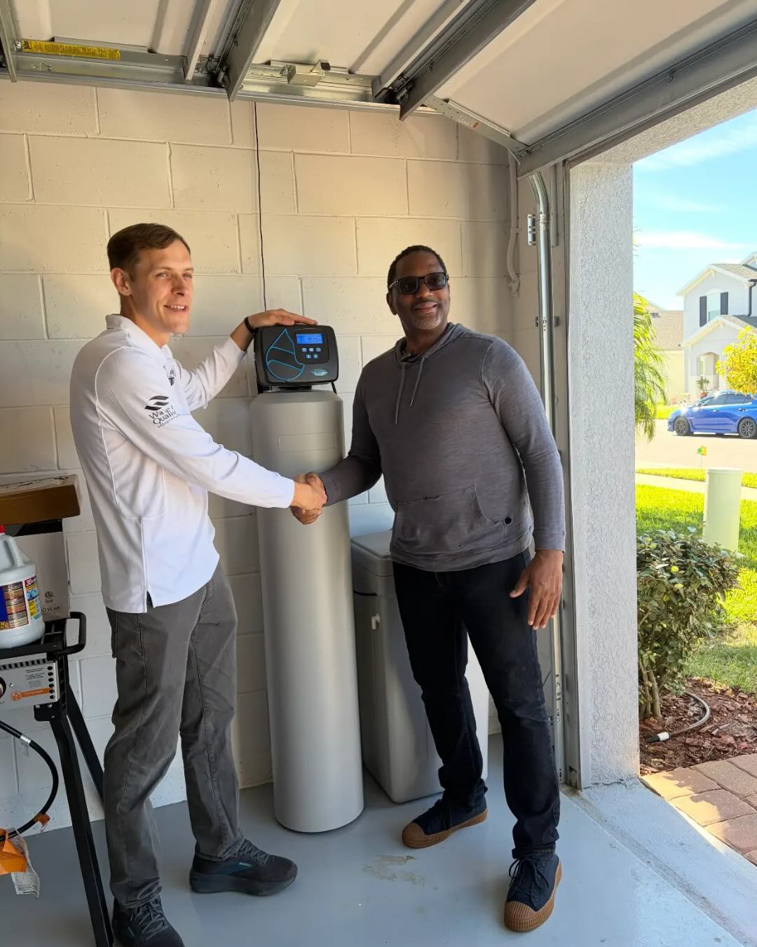 Happy client with Water Filtration System installed by AquaClear Solutions FL in Belle Isle, FL