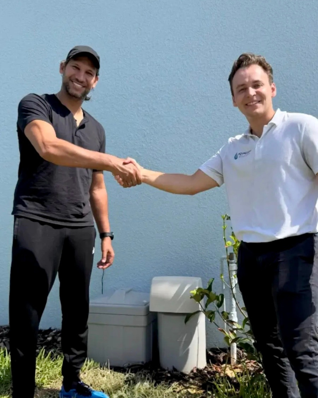 Happy client with Water Filtration System installed by AquaClear Solutions FL in Belle Isle, FL