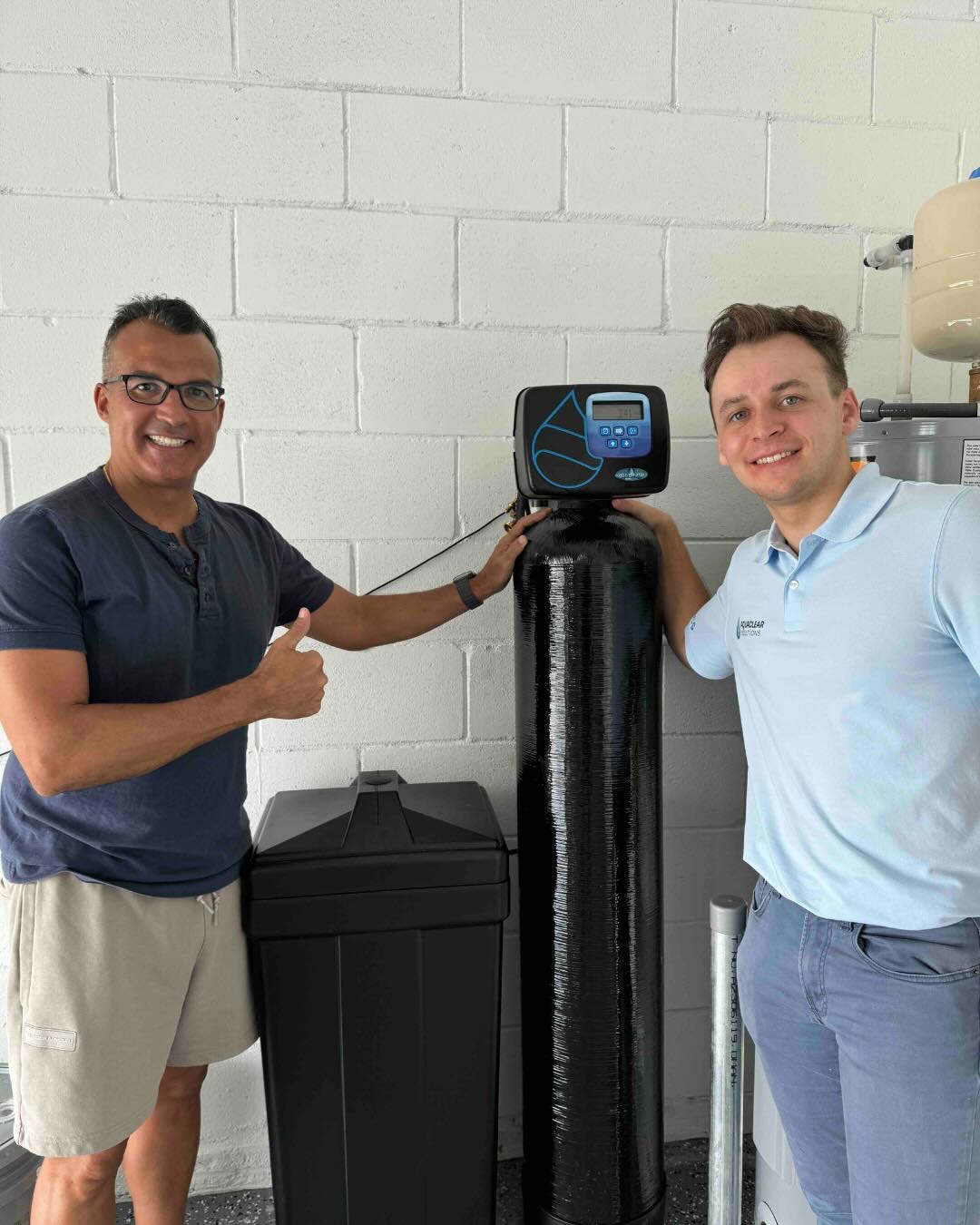Satisfied customer after Whole House Water Filter installation in Belle Isle, FL — AquaClear Solutions FL