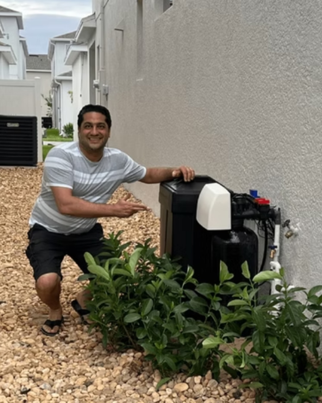 Happy client with Water Filtration System installed by AquaClear Solutions FL in Belle Isle, FL