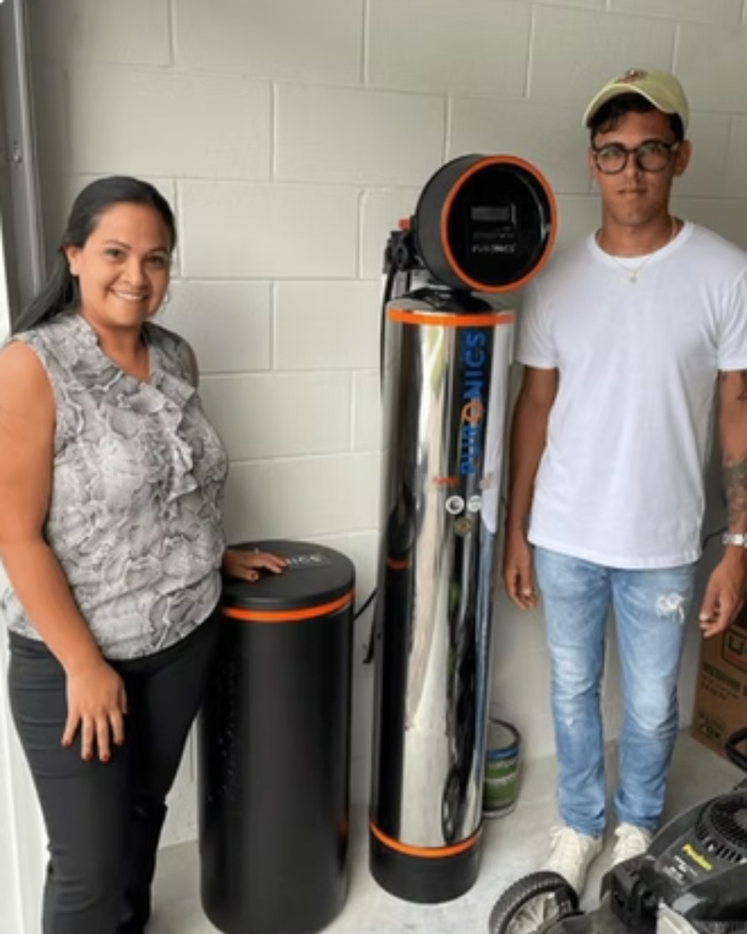 Happy client with Water Filtration System installed by AquaClear Solutions FL in Belle Isle, FL